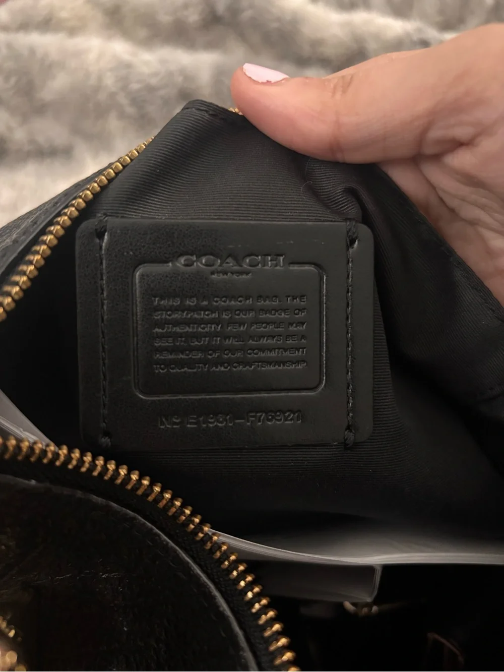 COACH Black Leather Shoulder Bag with Gold Accents